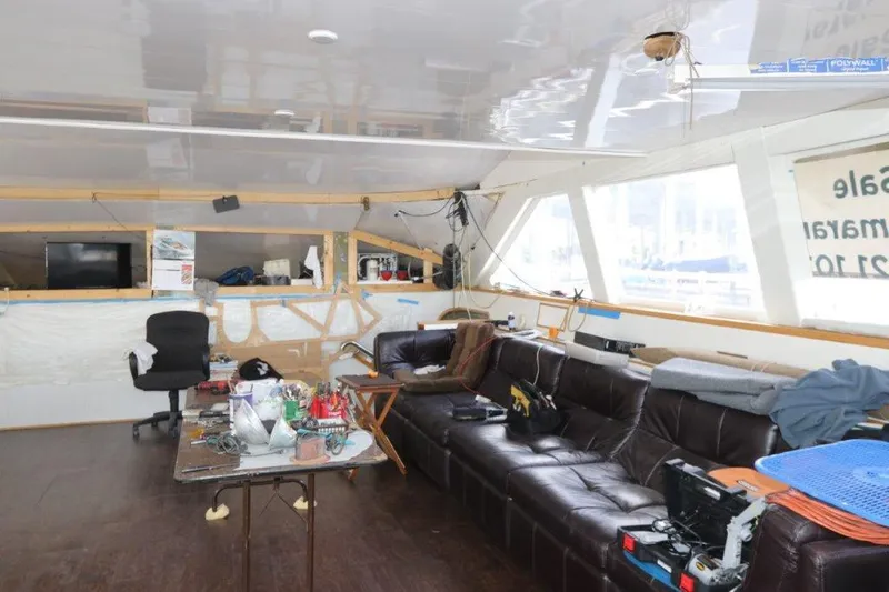  Yacht Photos Pics Interior of 1996 Mares Motor Yacht with leather sofa and work desk.