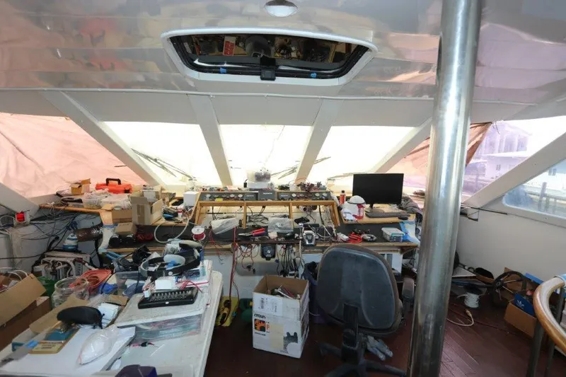  Yacht Photos Pics Interior of a 1996 Mares Motor Yacht with cluttered workspace and equipment.