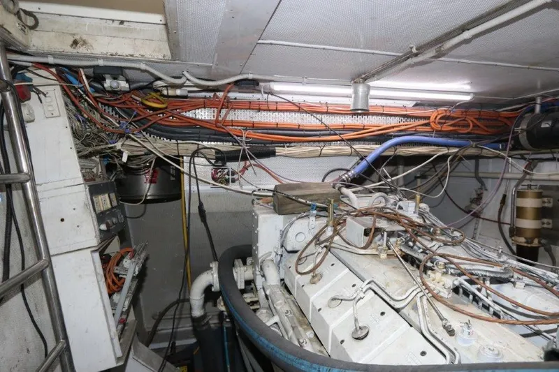 Yacht Photos Pics Engine room of a 1996 Mares Motor Yacht with visible wiring and machinery.