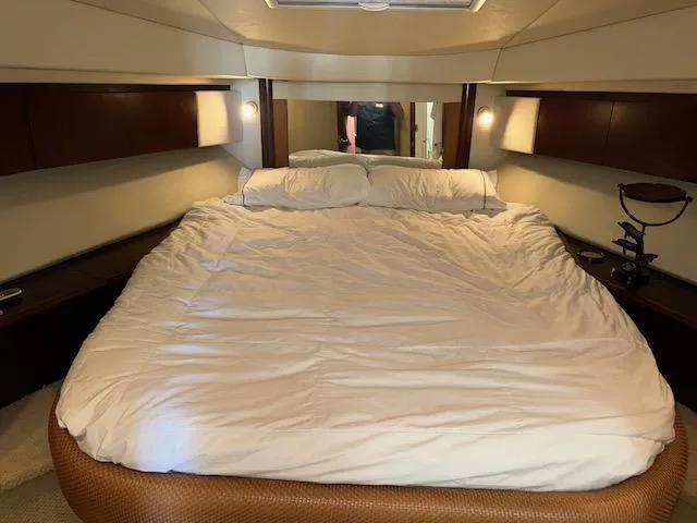  Yacht Photos Pics Luxurious bedroom interior of 2006 Sea Ray 44 Sedan Bridge yacht.