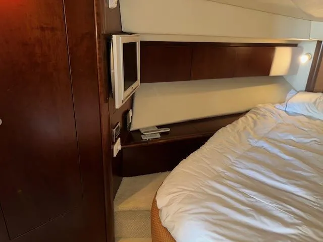 Yacht Photos Pics Luxurious cabin interior of 2006 Sea Ray 44 Sedan Bridge yacht with cozy bed.