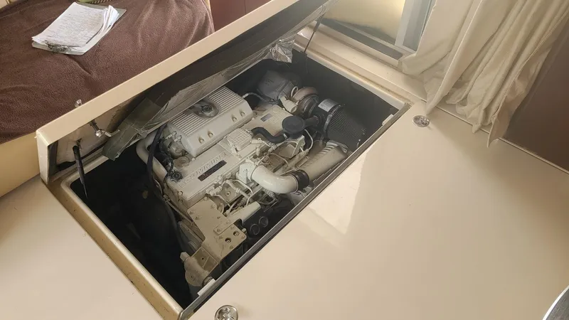  Yacht Photos Pics 2006 Sea Ray 44 Sedan Bridge engine compartment, showcasing the boat's powerful engine.