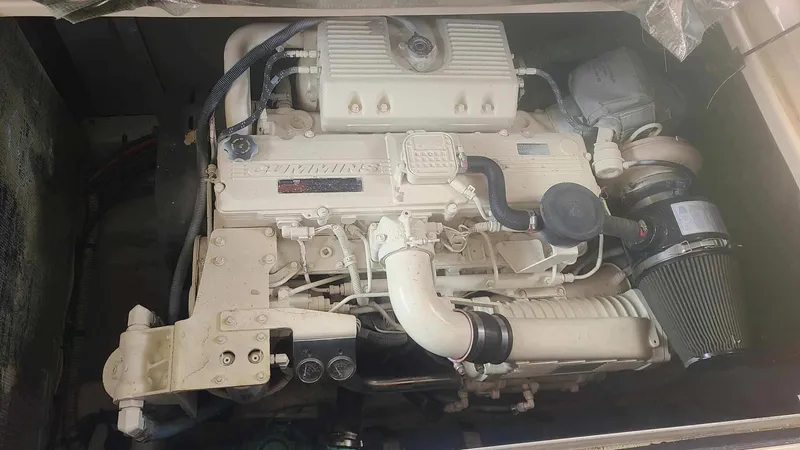  Yacht Photos Pics Engine of a 2006 Sea Ray 44 Sedan Bridge boat, showcasing intricate mechanical components.