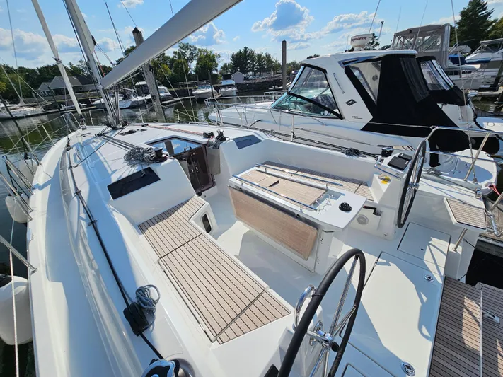  Yacht Photos Pics 2024 Beneteau Oceanis 40.1 sailboat with spacious deck and modern design in marina.