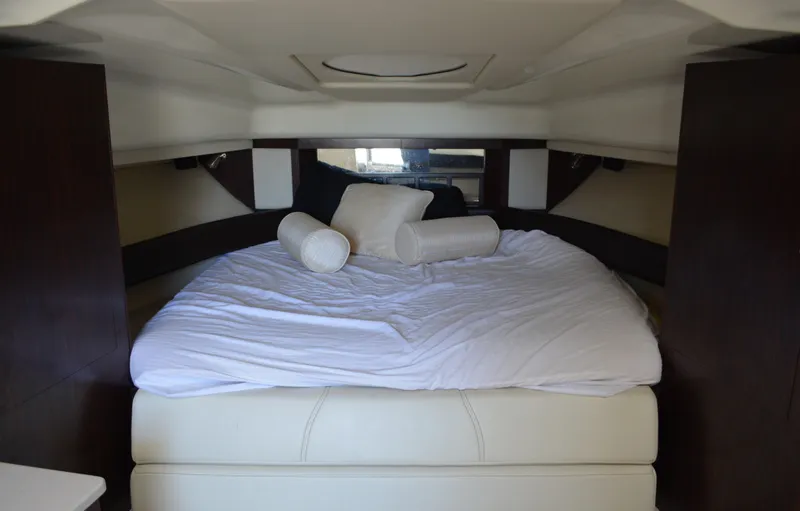 Ruff Life Yacht Photos Pics Luxurious cabin interior of 2013 Monterey 340 Sport Yacht with cozy bedding.