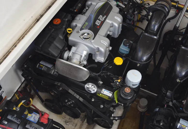 Ruff Life Yacht Photos Pics Engine compartment of a 2013 Monterey 340 Sport Yacht, featuring a powerful 8.2 engine.