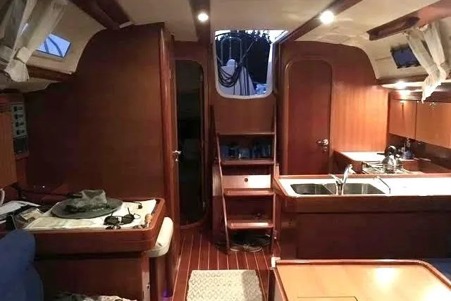 Falcon Yacht Photos Pics Interior of 2004 Dufour 40 Performance yacht with wooden cabinetry and modern amenities.
