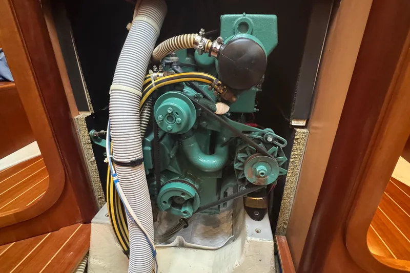 Falcon Yacht Photos Pics Engine compartment of a 2004 Dufour 40 Performance sailboat, showcasing mechanical components.