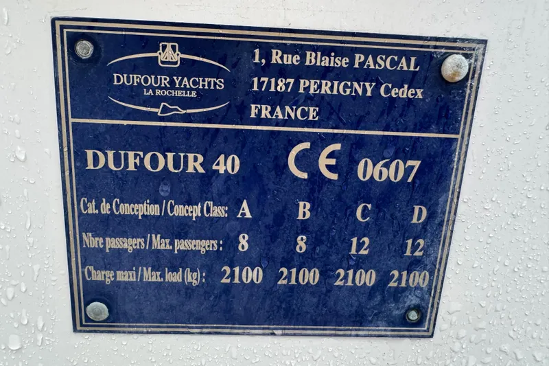 Falcon Yacht Photos Pics Plaque on Dufour 40 Performance yacht, 2004, showing specifications and passenger capacity.