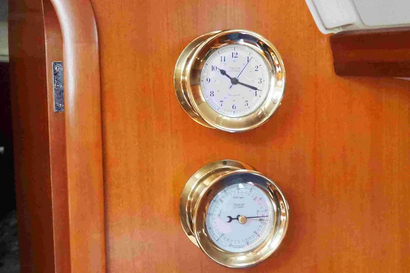 Falcon Yacht Photos Pics Brass clock and barometer on Dufour 40 Performance yacht, 2004 model.