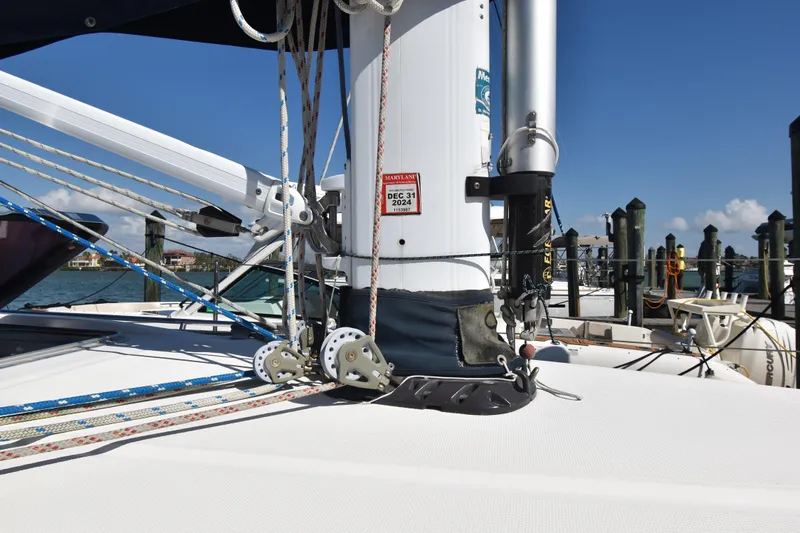 Zia Yacht Photos Pics Sailboat rigging on 2004 Sabre 386, docked with clear blue sky background.