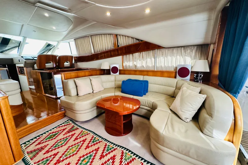  Yacht Photos Pics Luxurious 2001 Princess 56 yacht interior with elegant seating and vibrant decor.