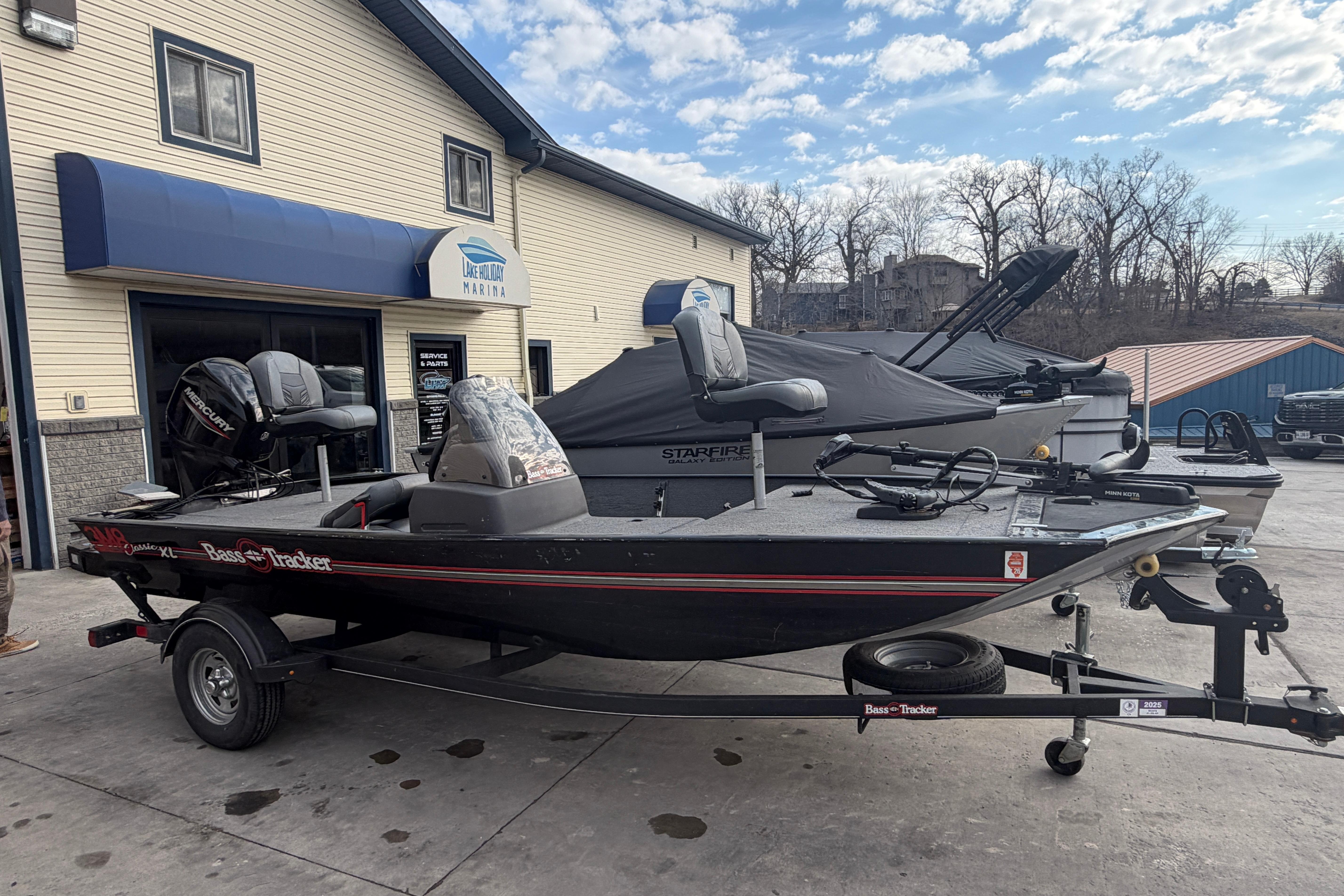 2020 Tracker Bass Tracker Classic XL boat on trailer at marina.