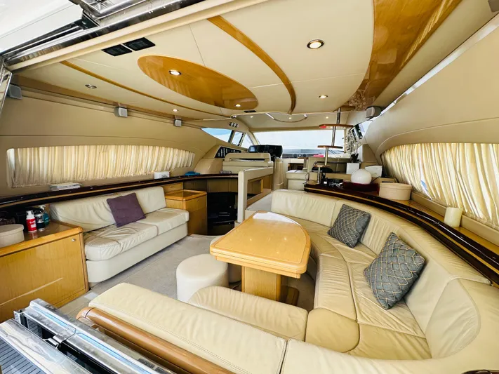  Yacht Photos Pics Luxurious interior of a 2005 Ferretti Yachts 550 with elegant seating and modern design.