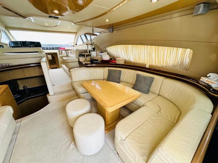  Yacht Photos Pics Luxurious interior of a 2005 Ferretti Yachts 550 with elegant seating and modern design.