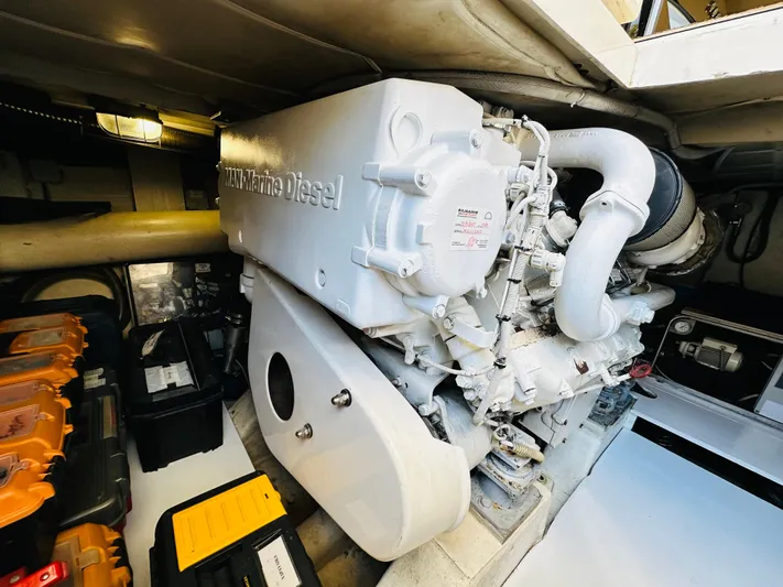  Yacht Photos Pics Engine room of a 2005 Ferretti Yachts 550, featuring a marine diesel engine.