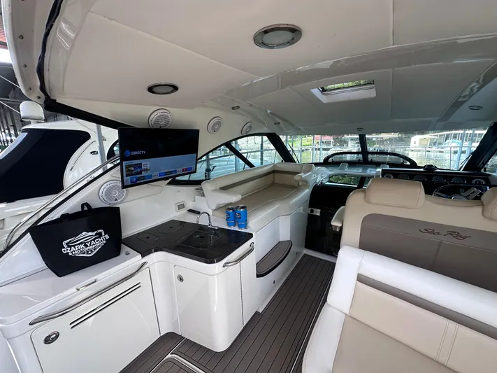  Yacht Photos Pics Interior of 2013 Sea Ray 410 Sundancer yacht with modern amenities and seating.