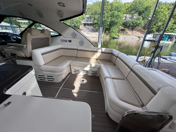  Yacht Photos Pics Luxurious interior of 2013 Sea Ray 410 Sundancer yacht with plush seating and scenic view.