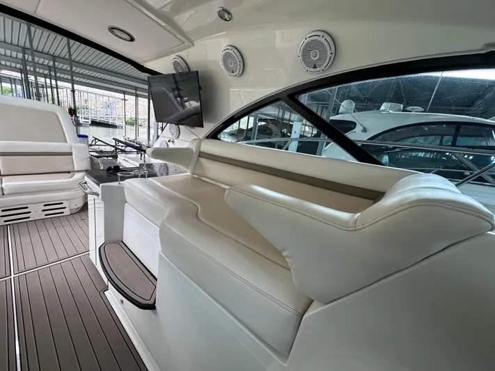  Yacht Photos Pics Luxurious interior of 2013 Sea Ray 410 Sundancer yacht with plush seating and modern amenities.