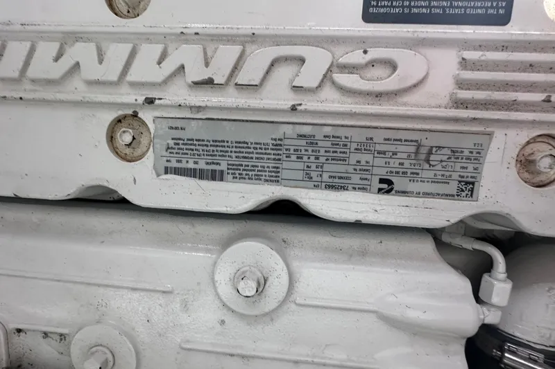  Yacht Photos Pics Engine detail of a 2013 Sea Ray 410 Sundancer boat, featuring Cummins branding.