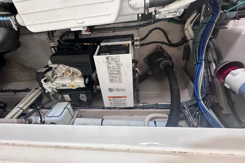  Yacht Photos Pics Engine compartment of a 2013 Sea Ray 410 Sundancer with visible wiring and components.