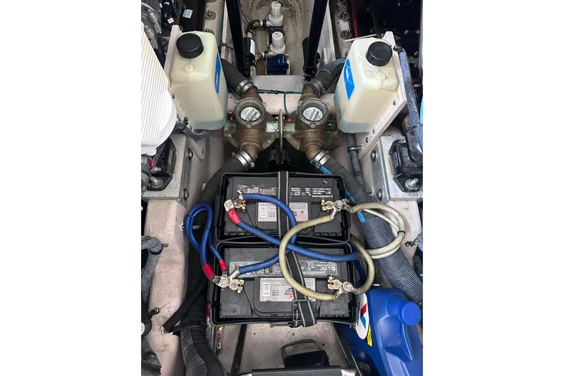  Yacht Photos Pics Engine compartment of 2013 Sea Ray 410 Sundancer with batteries and fluid reservoirs.