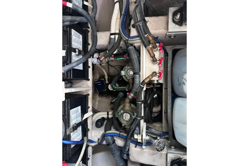  Yacht Photos Pics Engine compartment of a 2013 Sea Ray 410 Sundancer with visible wiring and components.