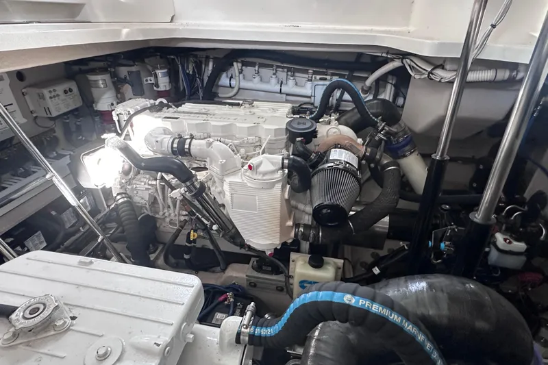  Yacht Photos Pics Engine room of 2013 Sea Ray 410 Sundancer, showcasing detailed mechanical components.