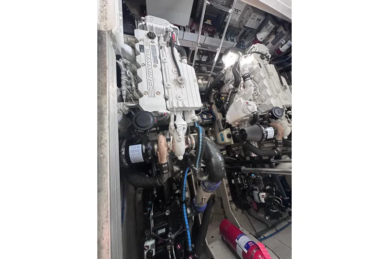  Yacht Photos Pics Engine room of 2013 Sea Ray 410 Sundancer with twin engines and fire extinguisher.
