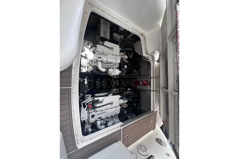  Yacht Photos Pics Engine compartment of 2013 Sea Ray 410 Sundancer yacht, showcasing dual engines.