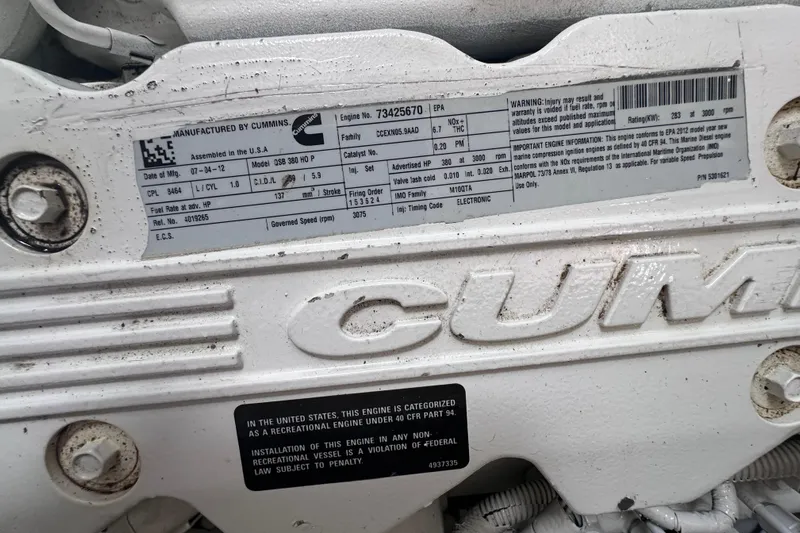  Yacht Photos Pics Cummins engine label on 2013 Sea Ray 410 Sundancer, displaying specifications and compliance details.