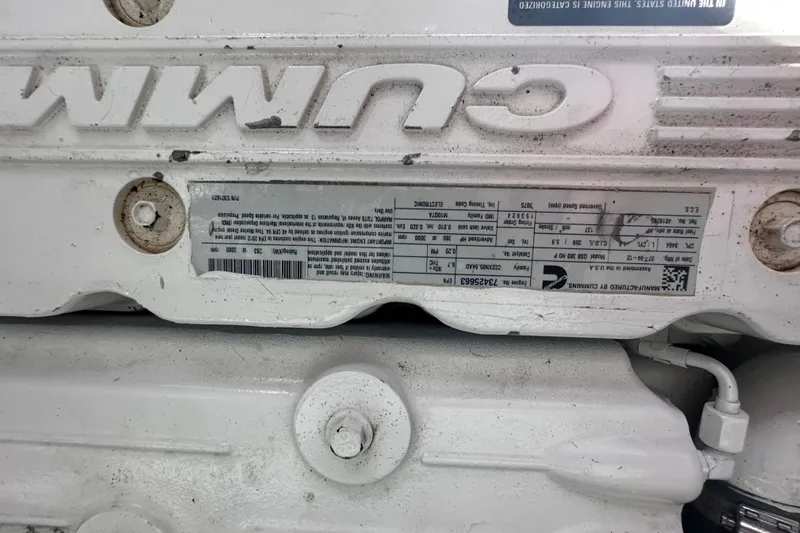  Yacht Photos Pics Engine label on a 2013 Sea Ray 410 Sundancer, featuring Cummins branding.