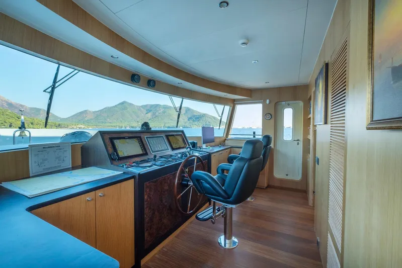  Yacht Photos Pics Pilothouse of 2022 Custom 85 Semi Displacement Trawler with scenic ocean view.