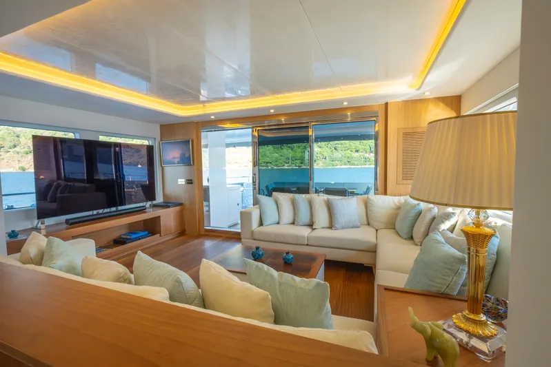  Yacht Photos Pics Luxurious interior of 2022 Custom 85 Semi Displacement Trawler with elegant seating and decor.