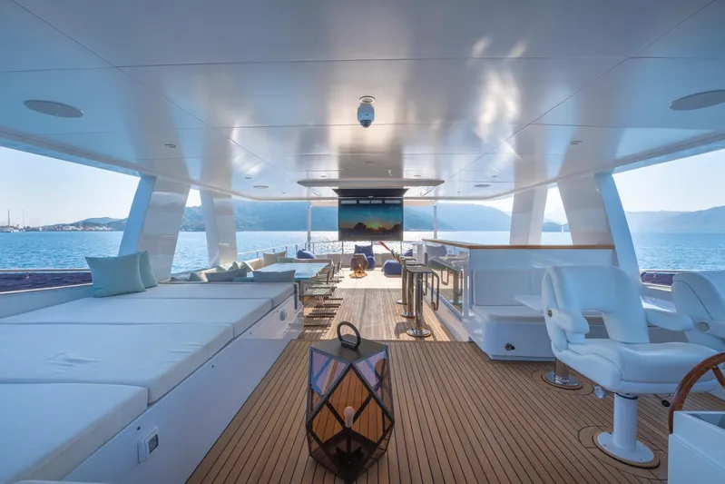  Yacht Photos Pics Luxurious 2022 Custom 85 Semi Displacement Trawler yacht interior with ocean view and modern seating.
