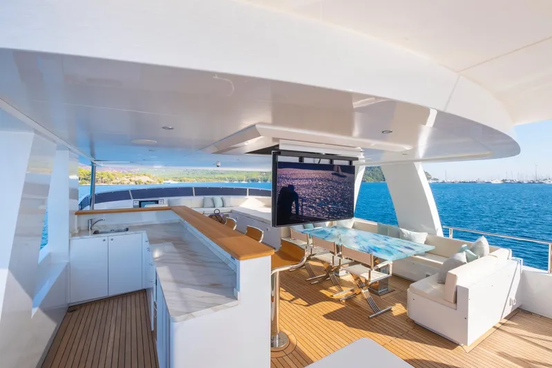 Yacht Photos Pics Luxurious 2022 Custom 85 Semi Displacement Trawler yacht interior with ocean view and modern amenities.