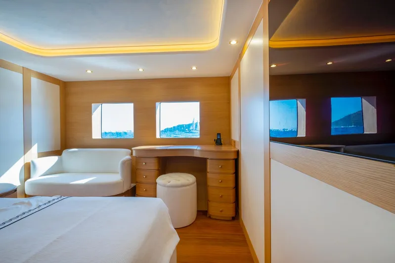 Yacht Photos Pics Luxurious cabin interior of 2022 Custom 85 Semi Displacement Trawler with modern furnishings.