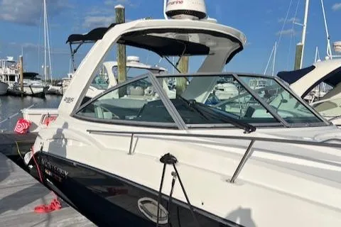  Yacht Photos Pics 2021 Monterey 295 Sport Yacht docked at marina under clear blue sky.