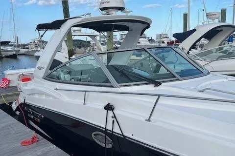  Yacht Photos Pics 2021 Monterey 295 Sport Yacht docked at marina, sleek design, clear skies.