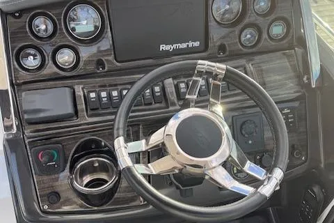  Yacht Photos Pics Dashboard of 2021 Monterey 295 Sport Yacht with Raymarine navigation system.