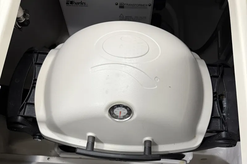 Bad Dog Yacht Photos Pics White grill with temperature gauge on 2021 Sabre 42 Fly Bridge yacht.