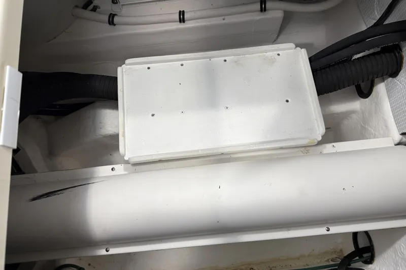 Bad Dog Yacht Photos Pics Engine compartment of 2021 Sabre 42 Fly Bridge with visible wiring and components.