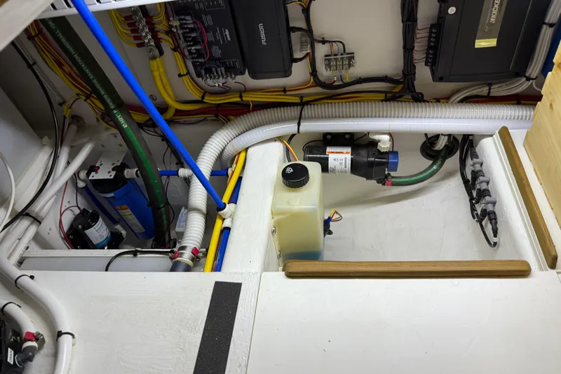 Bad Dog Yacht Photos Pics Engine room of 2021 Sabre 42 Fly Bridge with wiring and components.