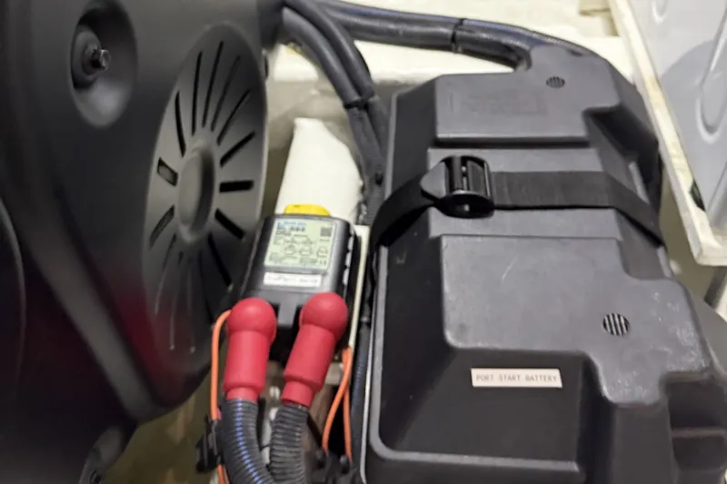 Bad Dog Yacht Photos Pics Engine compartment of 2021 Sabre 42 Fly Bridge with battery and wiring.