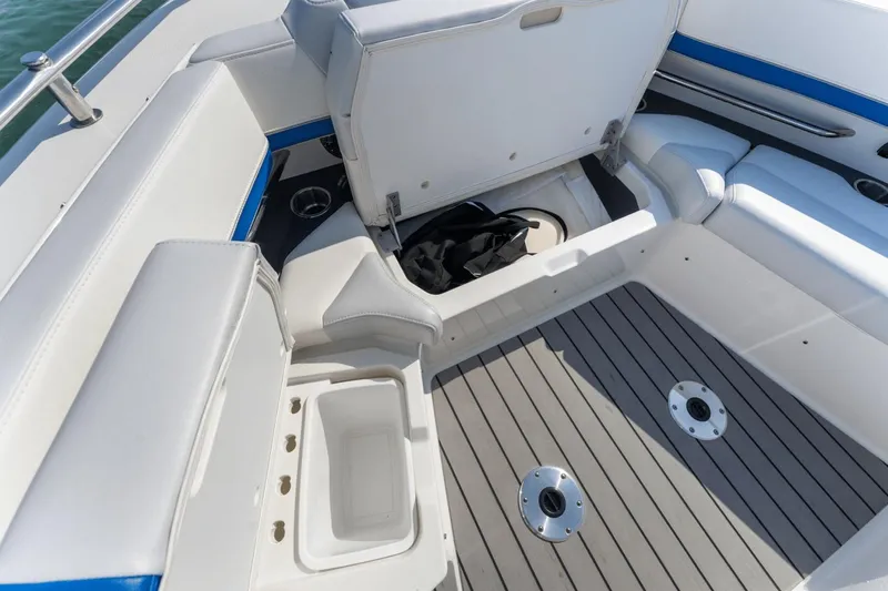  Yacht Photos Pics 2024 Formula 380 Super Sport Crossover boat interior with seating and storage compartments.