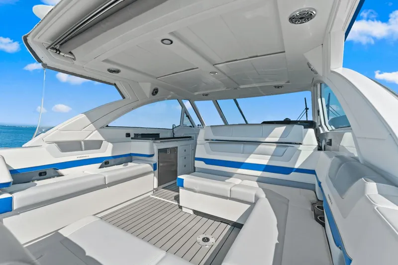  Yacht Photos Pics 2024 Formula 380 Super Sport Crossover interior with sleek seating and modern design.