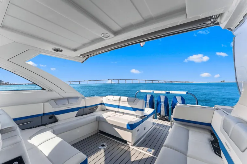  Yacht Photos Pics 2024 Formula 380 Super Sport Crossover interior with ocean view and bridge in background.