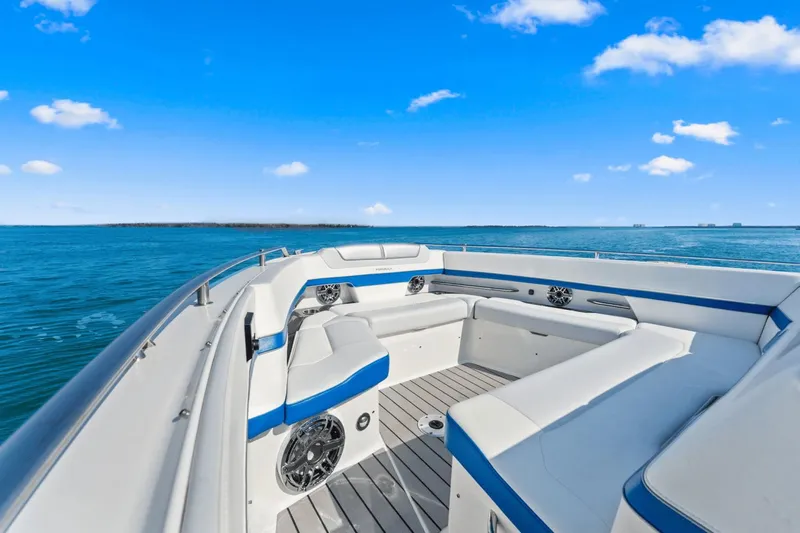  Yacht Photos Pics 2024 Formula 380 Super Sport Crossover boat interior on open water, clear blue sky.