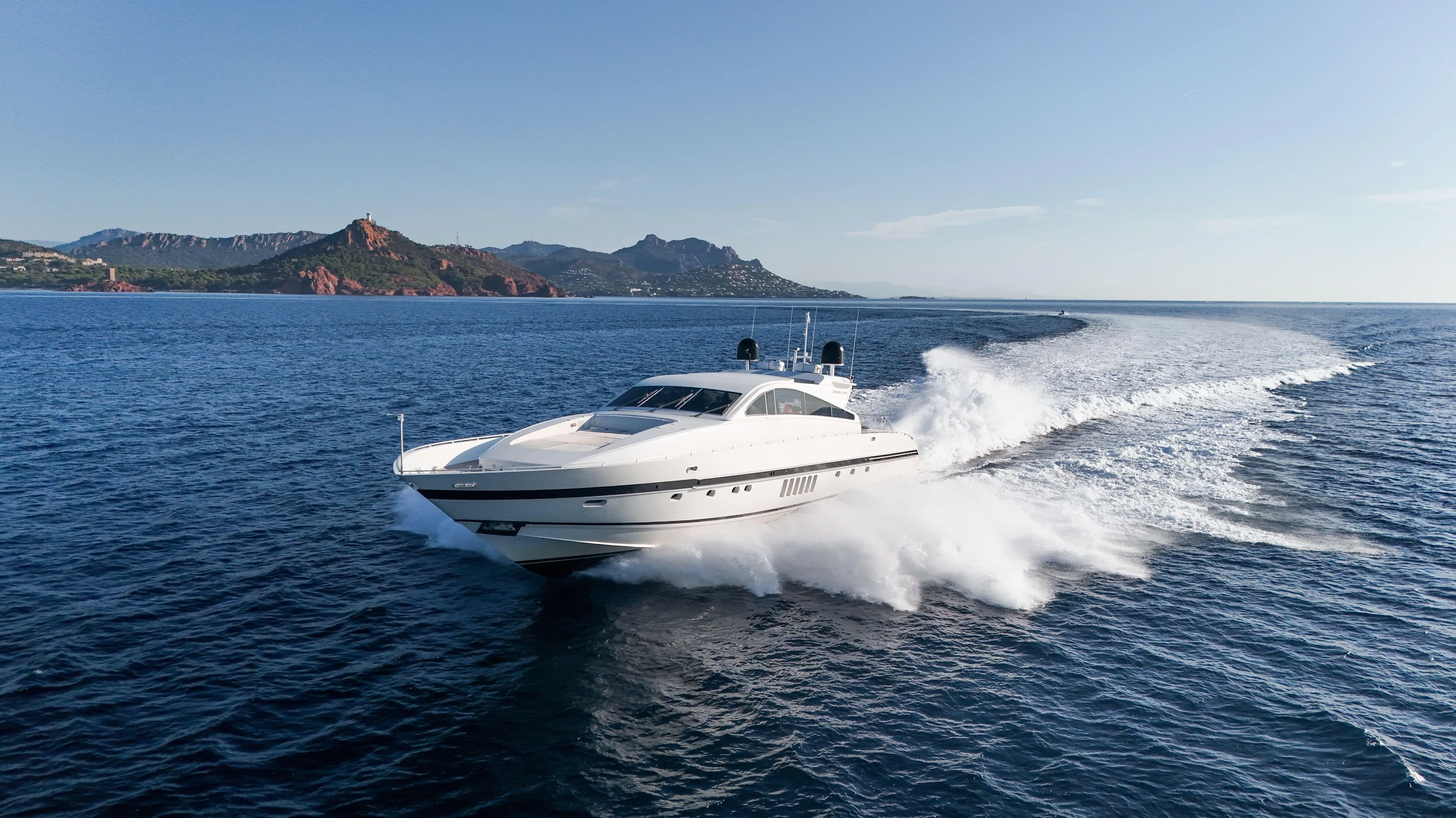 Luxury Arno Leopard 27m yacht cruising on open sea, 1997 model.