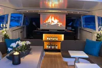 Luxurious interior of 1997 Arno Leopard 27m yacht with cozy seating and elegant decor.